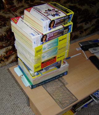 Symmetrical phone book stacking. No human would stack books this way. Or keep this many before throwing them out.