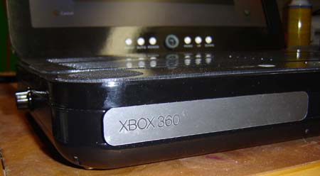 In case you didn't know what this console was, the DVD drive door reminds you
